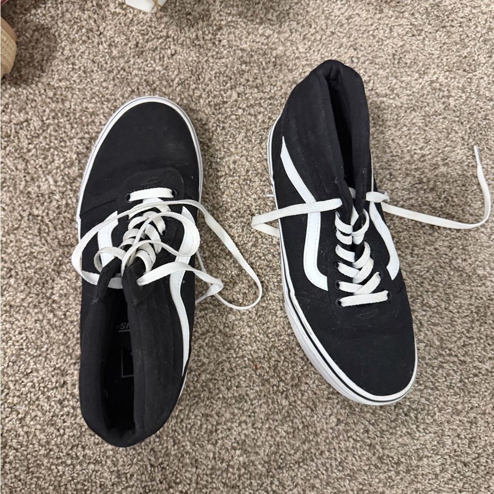 Vans Women's Black and White High-Top Sneakers